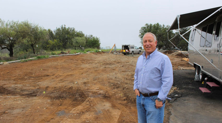 Jeremy Olsan on his property site north of Santa Rosa (Photo/Courtesy Olsan family and jweekly.com)