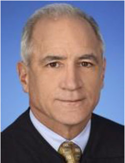 U.S. District Judge Robert Scola