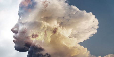 abstract image of clouds and person's face