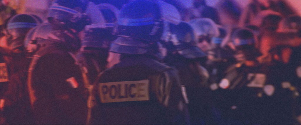 image of police in riot gear