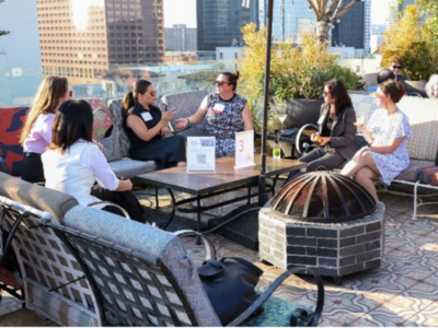 Attendees socializing at mixer