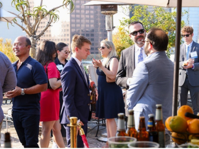 Attendees mingling at mixer