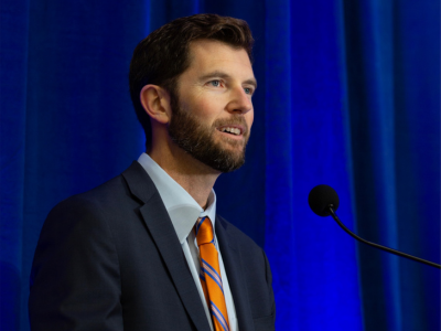 Speaker Miles Hogan