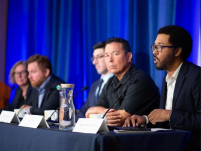 Speakers at table