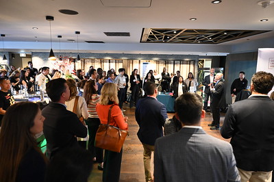Wide-shot of attendees at mixer