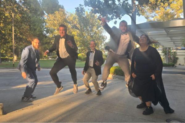 IP ExCom jumping mid pose