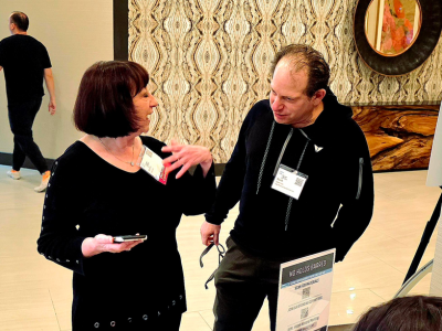 2 attendees socializing