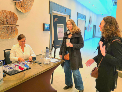 Staff checking in attendees