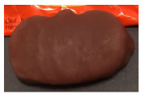 Reese Pumpkin Candy outside of wrapper