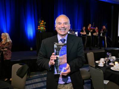 Tom Dahdouh with the Antitrust Lawyer of the Year Award